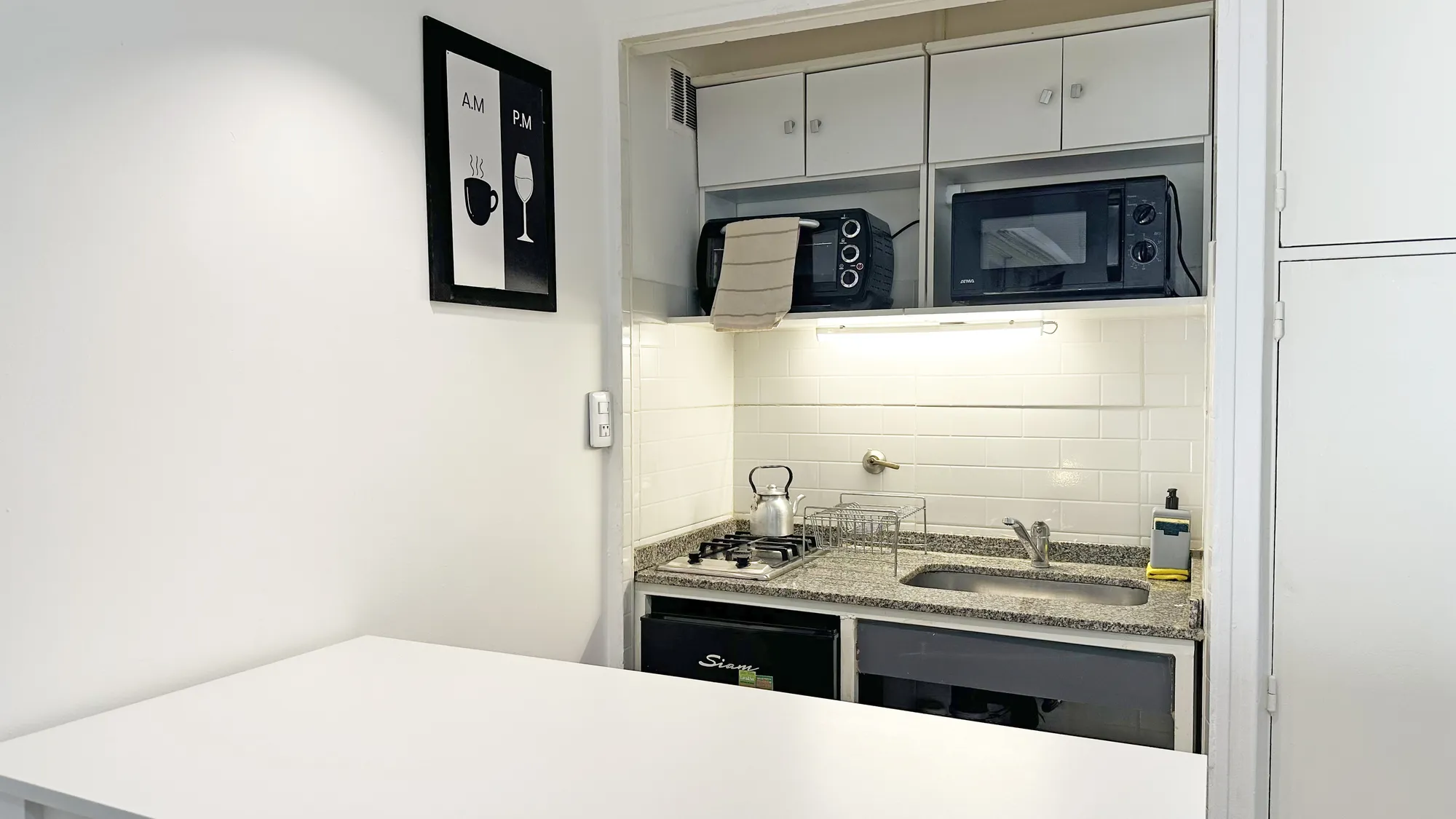 Estudio Nuevo y cálido con patio y parrilla 4